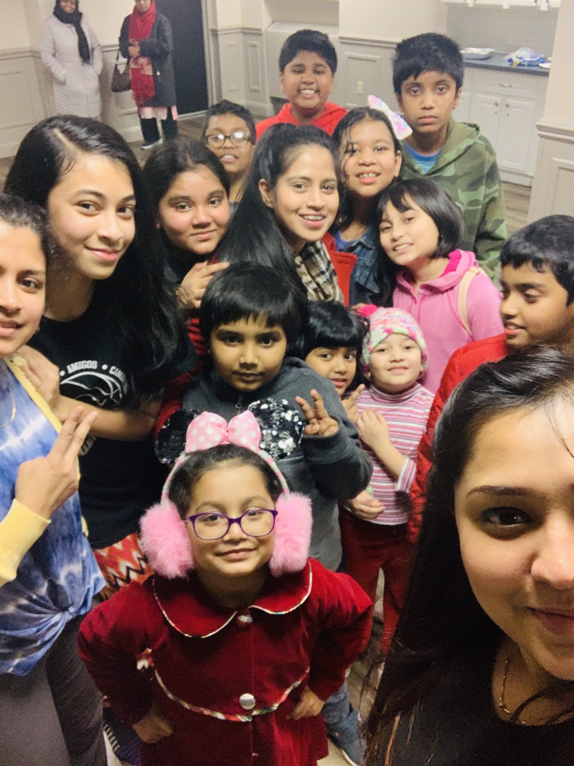 Photo of close-up of children and teens.