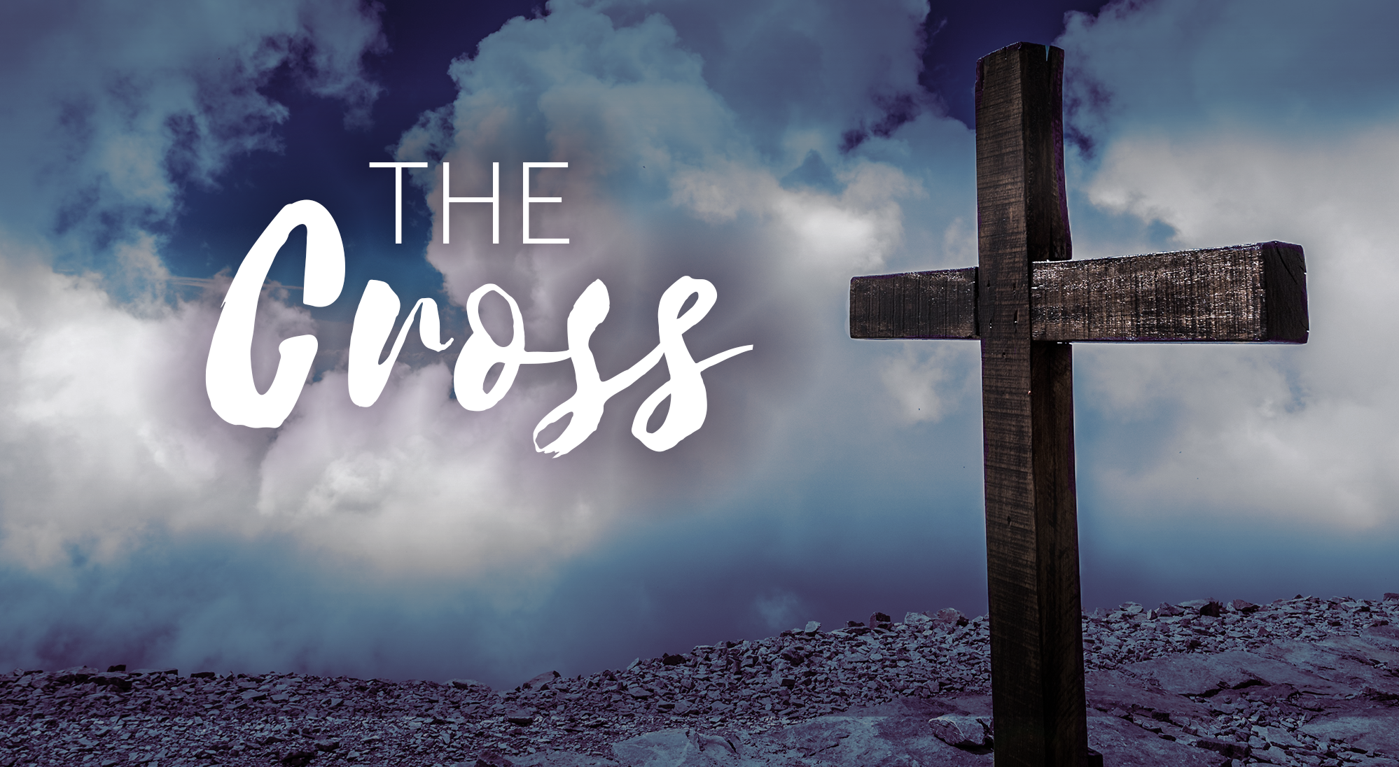 Photo of a wooden cross against a sky with clouds. Words read: "The Cross."
