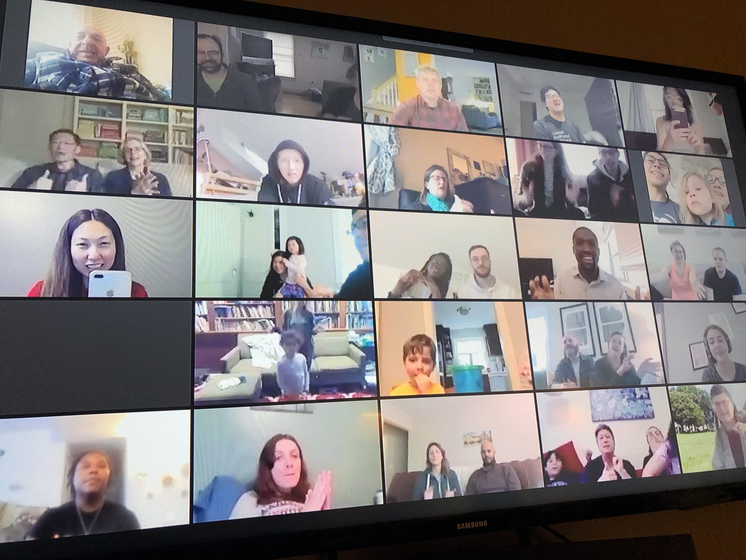 TV screen with 30 squares of people's faces.